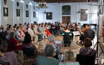 view of the audience and musicians