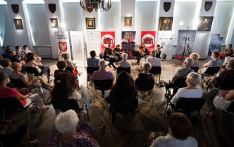 view of the audience and musicians