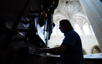 the man plays the piano