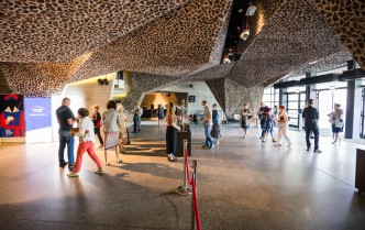 view of the foyer - people entering the building