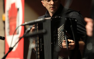 a man playing the accordion
