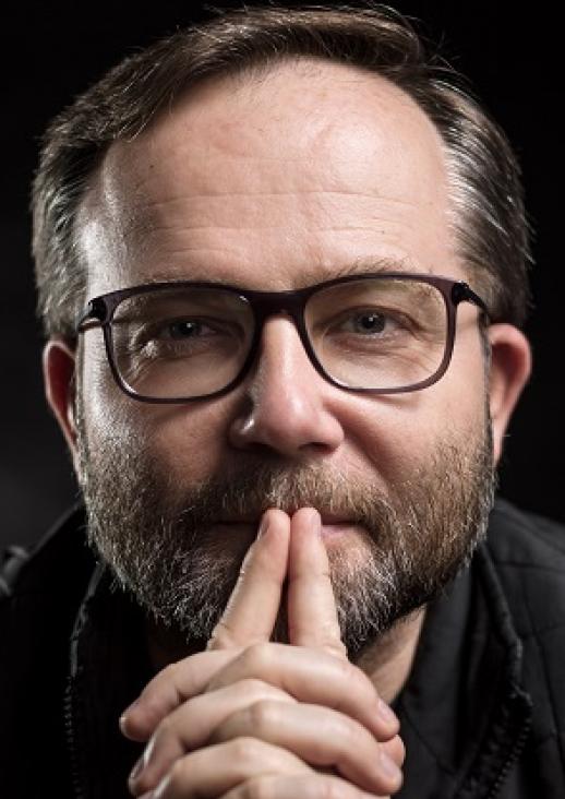 portrait of a man with glasses