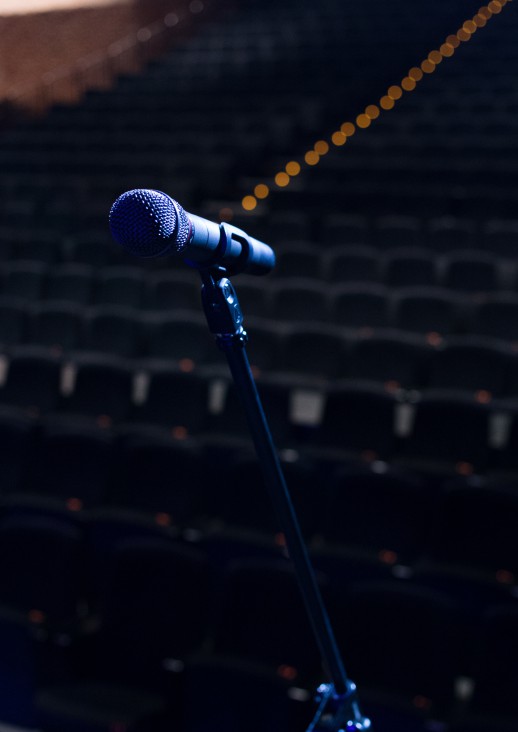 microphone on the background of an empty audience