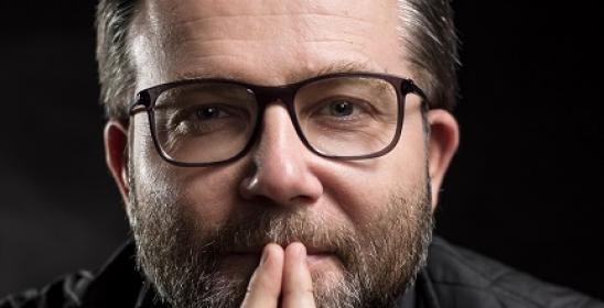 portrait of a man with glasses