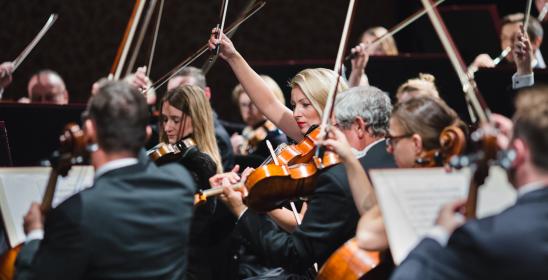 Musicians playing string instruments