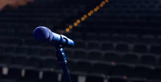 microphone on the background of an empty audience