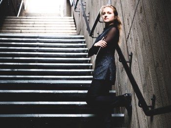 woman standing on the stairs