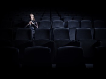 woman sitting in the audience